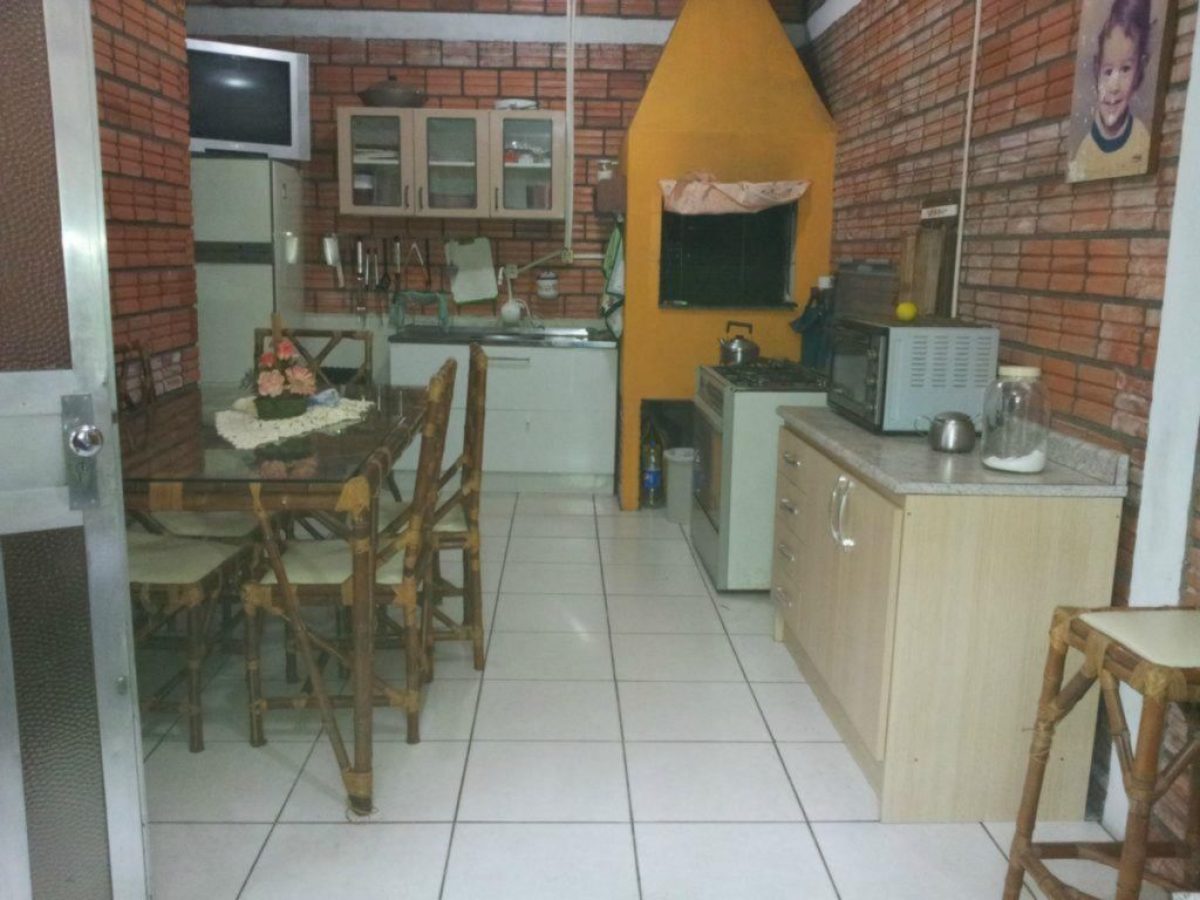 Casa à venda com 217m², 4 quartos, 1 vaga no bairro Rio Branco em Porto Alegre - Foto 1