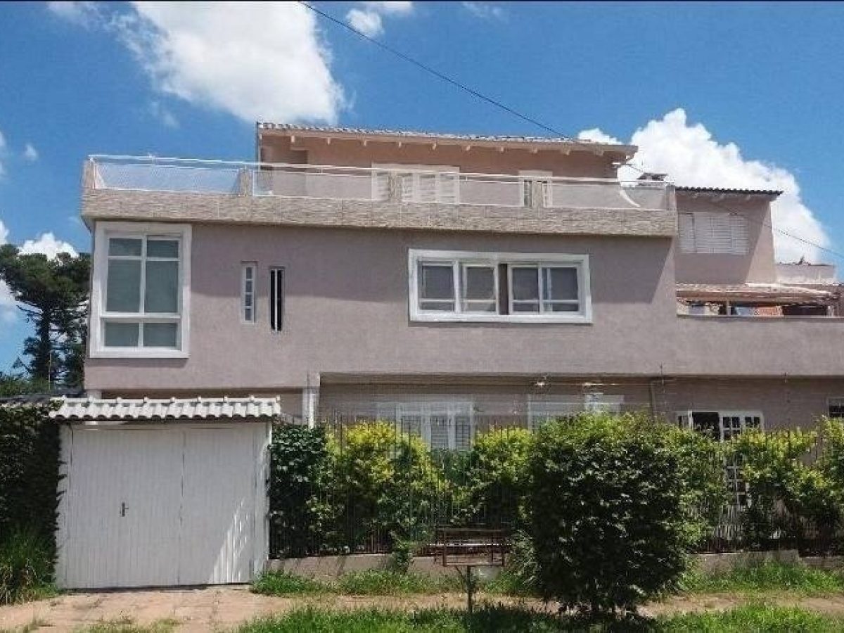 Casa à venda com 188m², 5 quartos, 2 suítes, 4 vagas no bairro Partenon em Porto Alegre - Foto 1