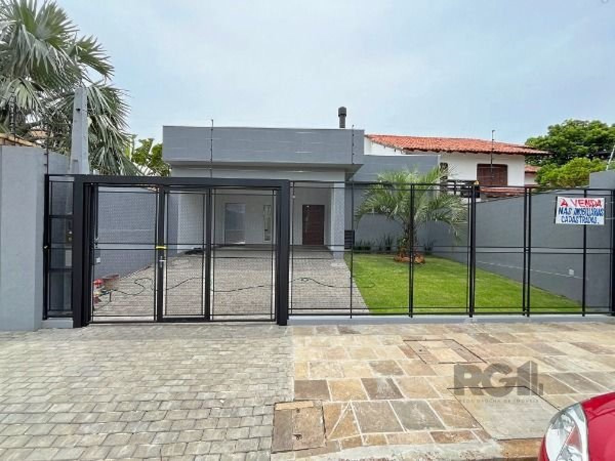 Casa à venda com 204m², 3 quartos, 2 suítes, 2 vagas no bairro Ipanema em Porto Alegre - Foto 1