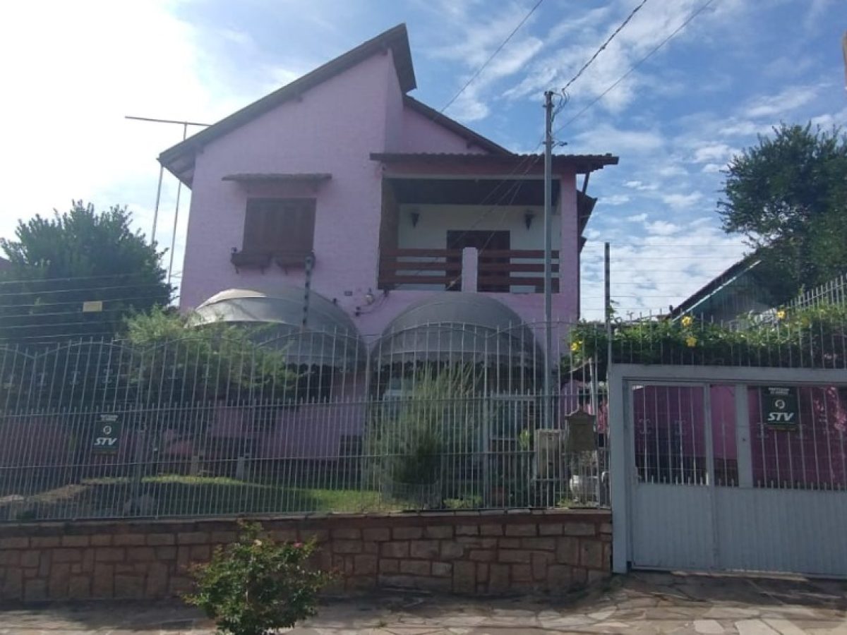 Casa à venda com 206m², 5 quartos, 1 suíte, 4 vagas no bairro Santa Tereza em Porto Alegre - Foto 1