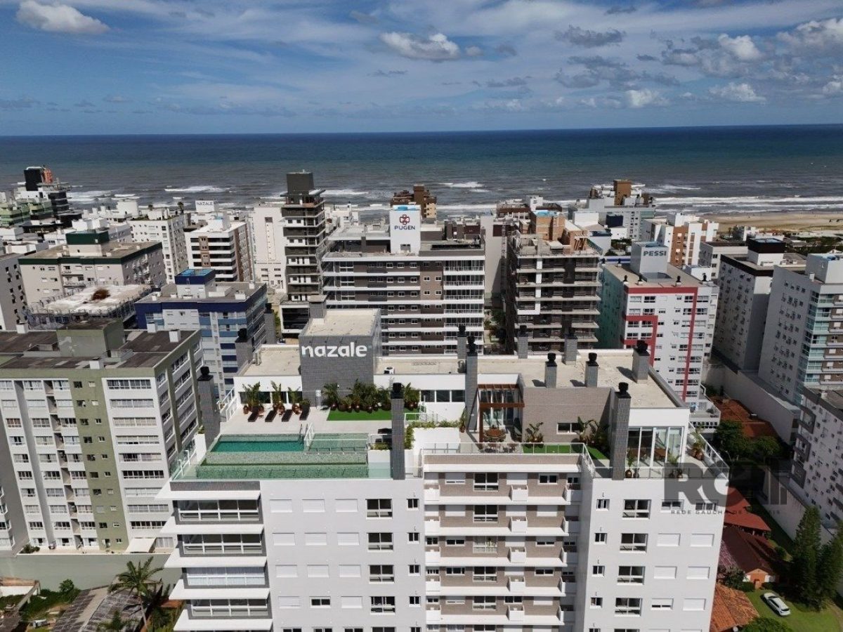 Apartamento à venda com 72m², 2 quartos, 2 suítes, 1 vaga no bairro Navegantes em Capão da Canoa - Foto 1