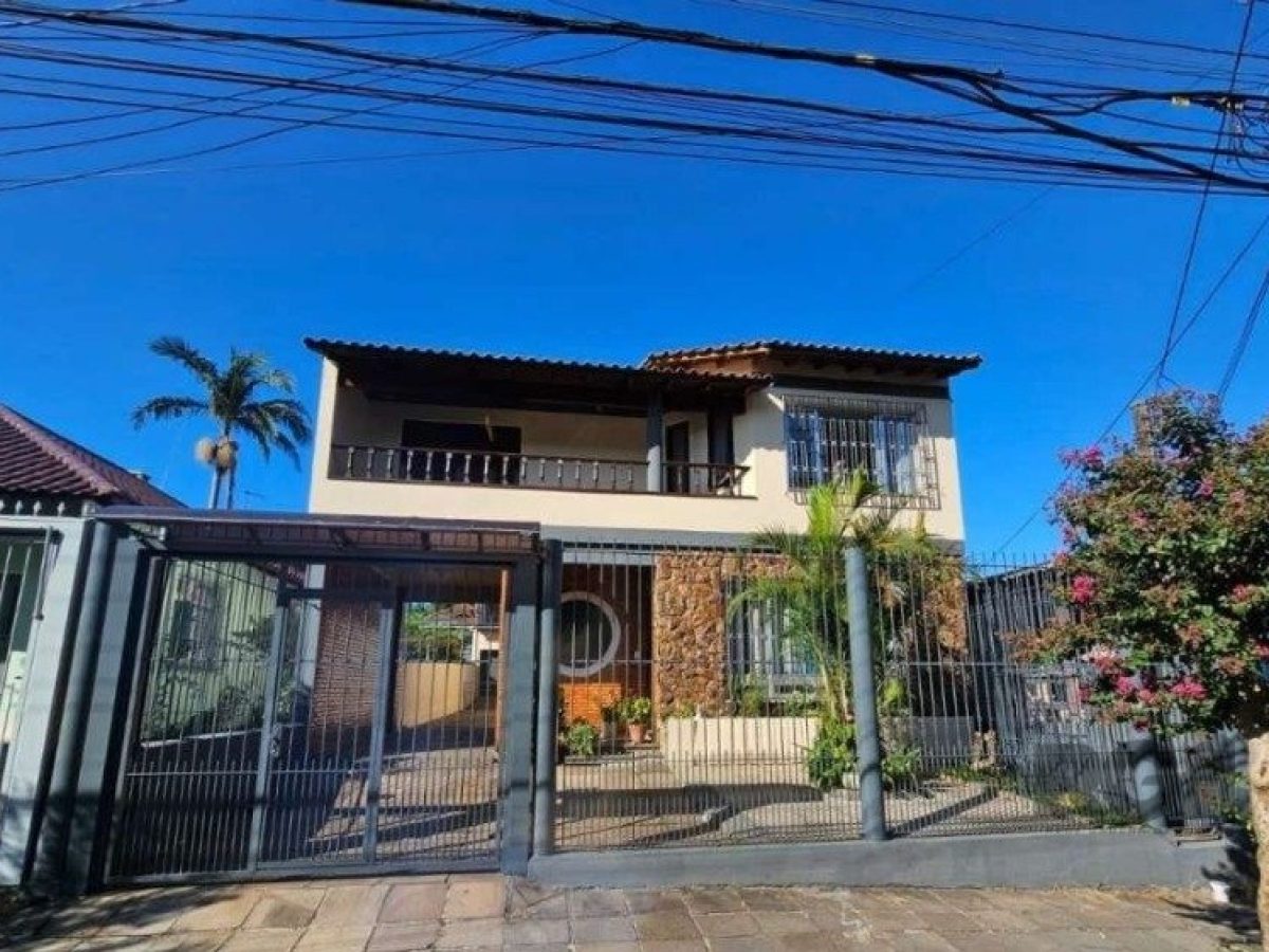 Casa à venda com 347m², 5 quartos, 3 suítes, 1 vaga no bairro Jardim Itu em Porto Alegre - Foto 1