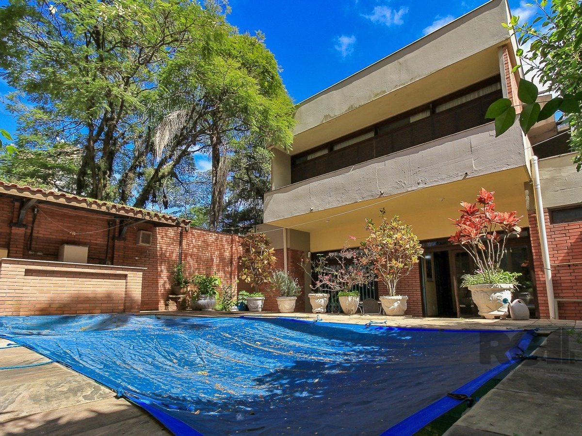 Casa à venda com 480m², 4 quartos, 4 suítes, 4 vagas no bairro Petrópolis em Porto Alegre - Foto 1