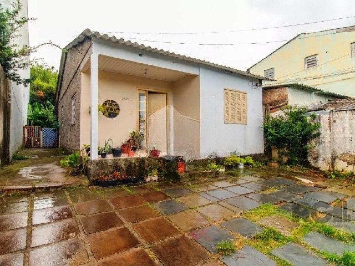 Casa à venda com 70m², 2 quartos, 3 vagas no bairro Santa Tereza em Porto Alegre - Foto 1