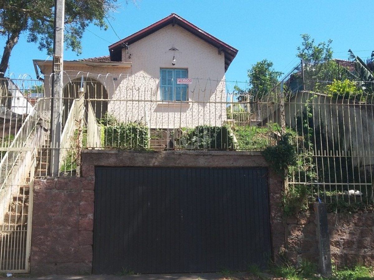 Casa à venda com 108m², 4 quartos, 1 vaga no bairro Santa Tereza em Porto Alegre - Foto 1