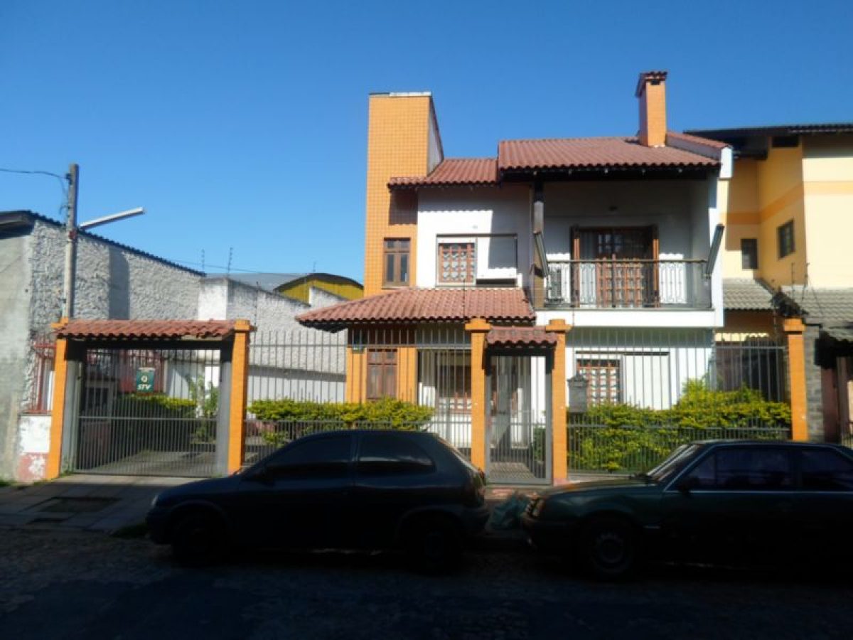 Casa à venda com 400m², 6 quartos, 2 suítes, 5 vagas no bairro Santo Antônio em Porto Alegre - Foto 1