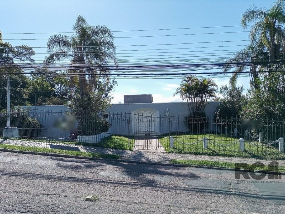 Casa à venda com 580m², 3 quartos, 1 suíte, 3 vagas no bairro Santa Tereza em Porto Alegre - Foto 1