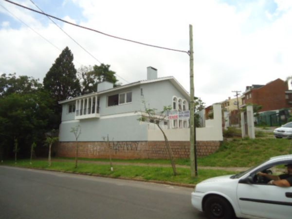 Casa à venda com 350m², 4 quartos, 1 suíte, 4 vagas no bairro Chácara das Pedras em Porto Alegre - Foto 1