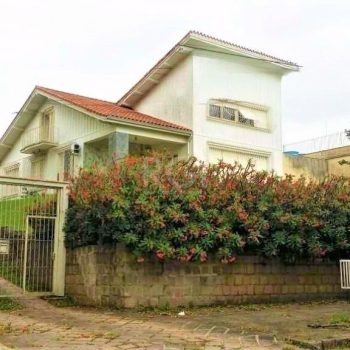 Casa à venda com 583m², 3 quartos, 4 vagas no bairro Três Figueiras em Porto Alegre