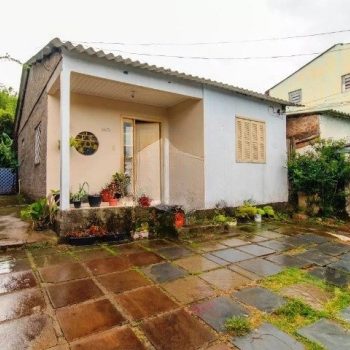 Casa à venda com 70m², 2 quartos, 3 vagas no bairro Santa Tereza em Porto Alegre