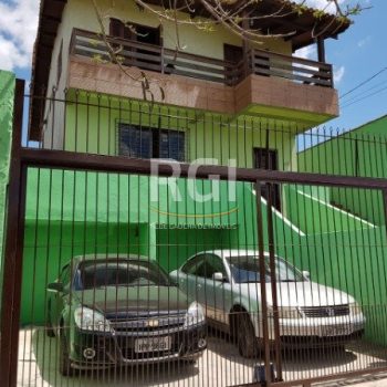 Casa à venda com 450m², 4 quartos, 1 suíte, 2 vagas no bairro Vila Ipiranga em Porto Alegre