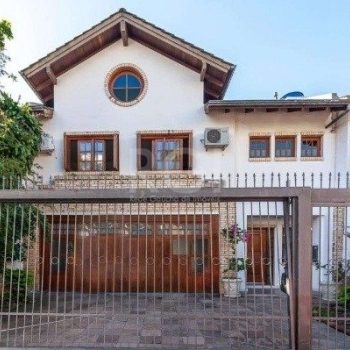 Casa à venda com 286m², 4 quartos, 3 suítes, 6 vagas no bairro Jardim Botânico em Porto Alegre