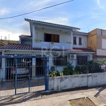 Casa à venda com 270m², 4 quartos, 1 suíte, 5 vagas no bairro Partenon em Porto Alegre