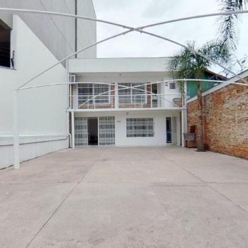 Casa à venda com 130m², 3 quartos, 1 suíte, 8 vagas no bairro Praia de Belas em Porto Alegre