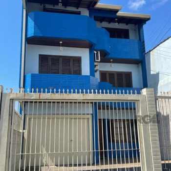 Casa à venda com 420m², 4 quartos, 1 suíte, 3 vagas no bairro Partenon em Porto Alegre