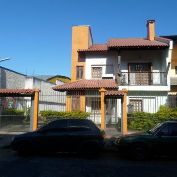 Casa à venda com 400m², 6 quartos, 2 suítes, 5 vagas no bairro Santo Antônio em Porto Alegre