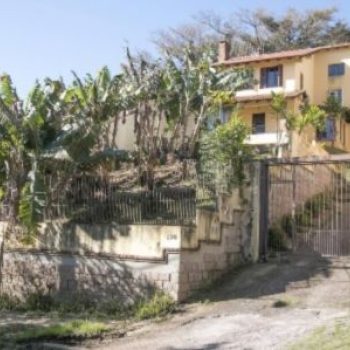 Casa à venda com 450m², 4 quartos, 3 suítes, 4 vagas no bairro Ipanema em Porto Alegre