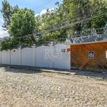 Casa à venda com 500m², 5 quartos, 4 suítes, 6 vagas no bairro Ipanema em Porto Alegre