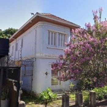 Casa à venda com 415m², 5 quartos, 3 vagas no bairro Menino Deus em Porto Alegre