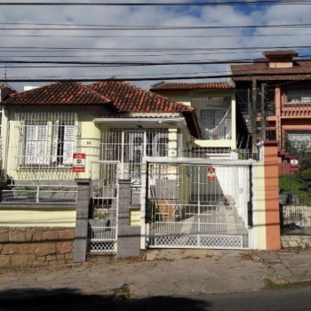 Casa à venda com 300m², 3 quartos, 3 suítes, 4 vagas no bairro Santa Tereza em Porto Alegre