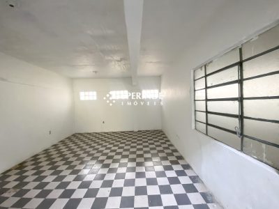 Casa para alugar com 430m², 5 quartos, 5 vagas no bairro Partenon em Porto Alegre - Foto 34