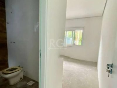 Casa à venda com 99m², 3 quartos, 1 suíte, 2 vagas no bairro Ipanema em Porto Alegre - Foto 8