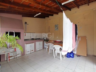 Casa à venda com 264m², 3 quartos, 2 vagas no bairro Santa Tereza em Porto Alegre - Foto 22