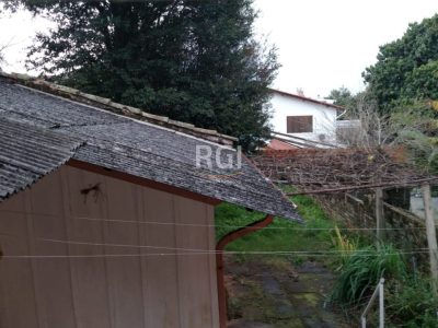 Casa à venda com 140m², 3 quartos, 3 vagas no bairro Santo Antônio em Porto Alegre - Foto 16