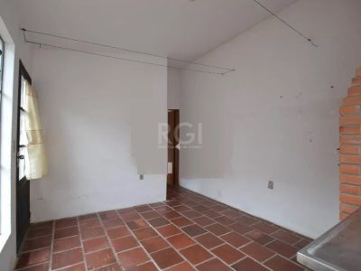 Casa à venda com 267m², 4 quartos, 1 suíte, 2 vagas no bairro Tristeza em Porto Alegre - Foto 34