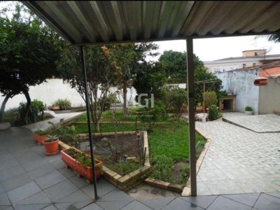 Casa à venda com 150m², 3 quartos, 1 suíte, 5 vagas no bairro Vila Ipiranga em Porto Alegre - Foto 6