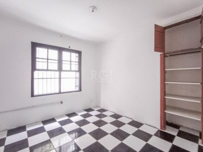 Casa à venda com 88m², 3 quartos, 1 suíte, 1 vaga no bairro Auxiliadora em Porto Alegre - Foto 8