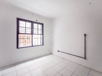 Casa à venda com 88m², 3 quartos, 1 suíte, 1 vaga no bairro Auxiliadora em Porto Alegre - Foto 15