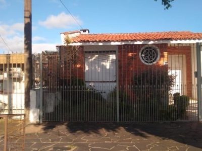 Casa à venda com 414m², 4 quartos, 1 suíte, 4 vagas no bairro Santo Antônio em Porto Alegre - Foto 4