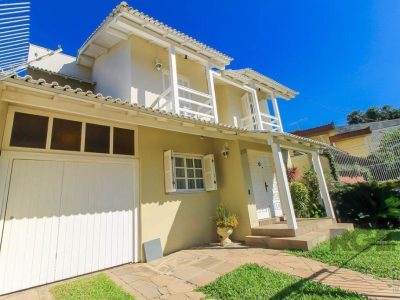 Casa à venda com 600m², 4 quartos, 2 suítes, 4 vagas no bairro Chácara das Pedras em Porto Alegre - Foto 2