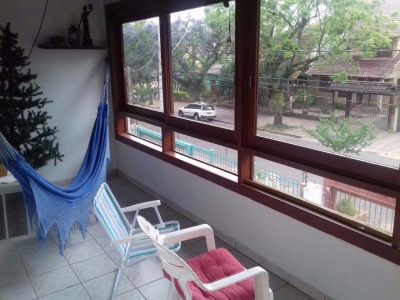 Casa à venda com 130m², 5 quartos, 1 suíte, 2 vagas no bairro Partenon em Porto Alegre - Foto 15