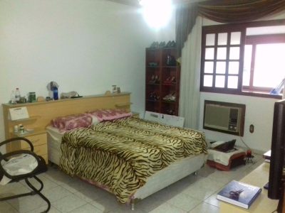 Casa à venda com 130m², 5 quartos, 1 suíte, 2 vagas no bairro Partenon em Porto Alegre - Foto 16