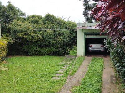 Casa à venda com 148m², 3 quartos, 4 vagas no bairro Santa Tereza em Porto Alegre - Foto 18