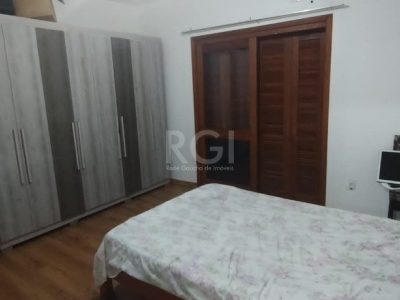 Casa à venda com 136m², 3 quartos, 2 suítes, 2 vagas no bairro Petrópolis em Porto Alegre - Foto 17