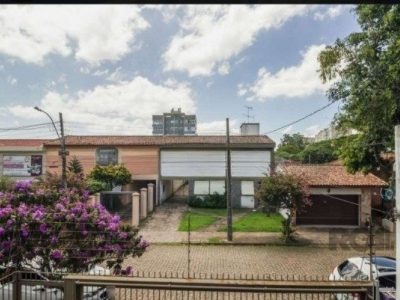 Casa à venda com 300m², 3 quartos, 1 suíte, 4 vagas no bairro Jardim Lindóia em Porto Alegre - Foto 6