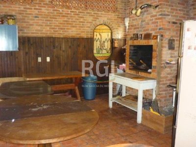 Casa à venda com 369m², 4 quartos, 2 suítes, 7 vagas no bairro Ipanema em Porto Alegre - Foto 24