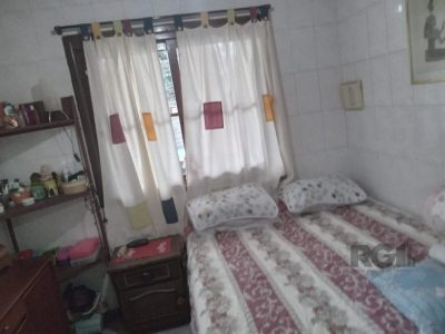 Casa à venda com 117m², 3 quartos, 1 vaga no bairro Partenon em Porto Alegre - Foto 11