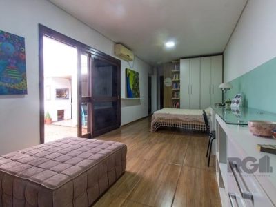 Casa à venda com 149m², 3 quartos, 1 suíte, 2 vagas no bairro Higienópolis em Porto Alegre - Foto 17