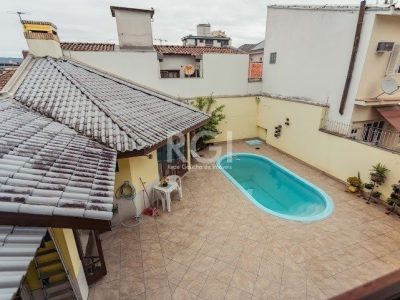 Casa à venda com 304m², 4 quartos, 2 suítes, 3 vagas no bairro Jardim Lindóia em Porto Alegre - Foto 33