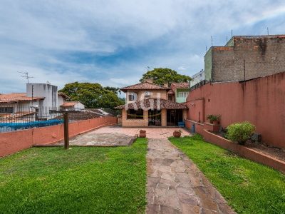 Casa à venda com 420m², 3 quartos, 1 suíte, 7 vagas no bairro Santa Tereza em Porto Alegre - Foto 31