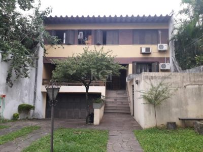 Casa à venda com 311m², 4 quartos, 2 suítes, 4 vagas no bairro Glória em Porto Alegre - Foto 5