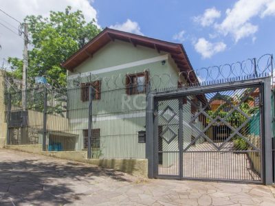 Casa à venda com 510m², 5 quartos, 1 suíte, 10 vagas no bairro Glória em Porto Alegre - Foto 2