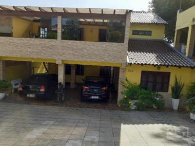 Casa à venda com 300m², 3 quartos, 1 suíte, 5 vagas no bairro Partenon em Porto Alegre - Foto 5