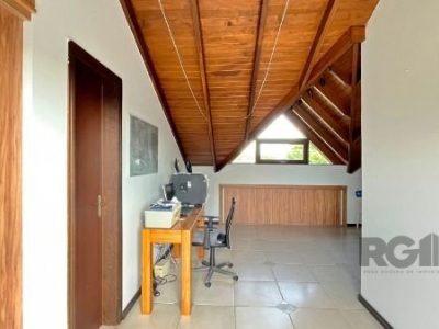 Casa à venda com 158m², 3 quartos, 1 suíte, 2 vagas no bairro Tristeza em Porto Alegre - Foto 44