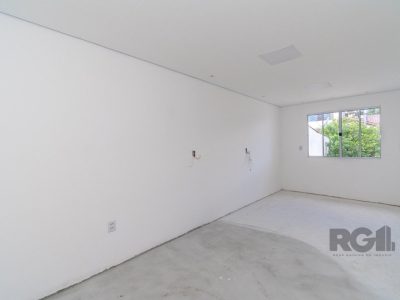 Casa à venda com 96m², 3 quartos, 2 suítes, 3 vagas no bairro Cristal em Porto Alegre - Foto 12