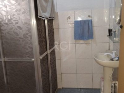 Casa à venda com 76m², 5 quartos, 3 vagas no bairro Santo Antônio em Porto Alegre - Foto 9